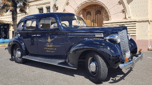A blue vintage car